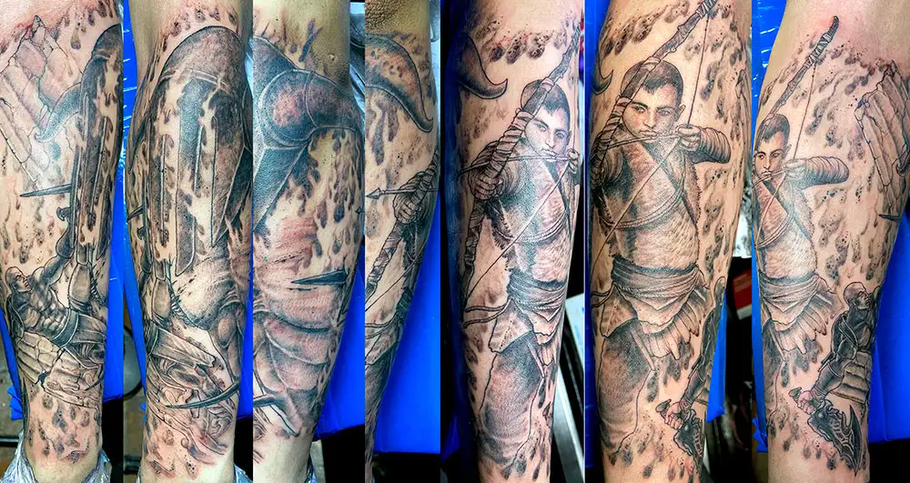 Punisher Skull logo calf tattoo