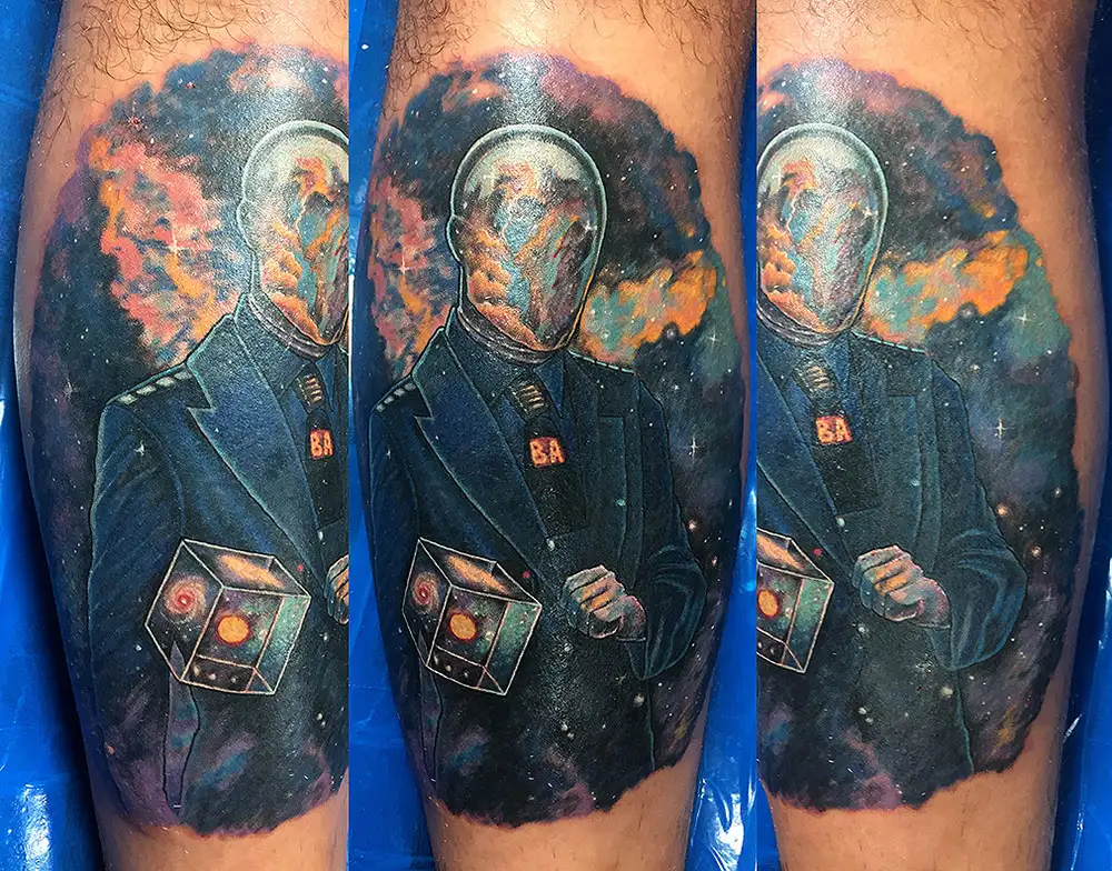 astronaut in tuxedo full color tattoo