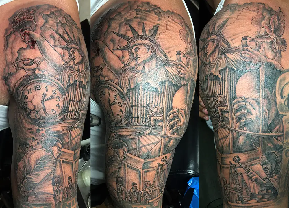 illustrative tattoo of a man going thru trial in a courtroom, jail time and eventually freedom under statue of liberty