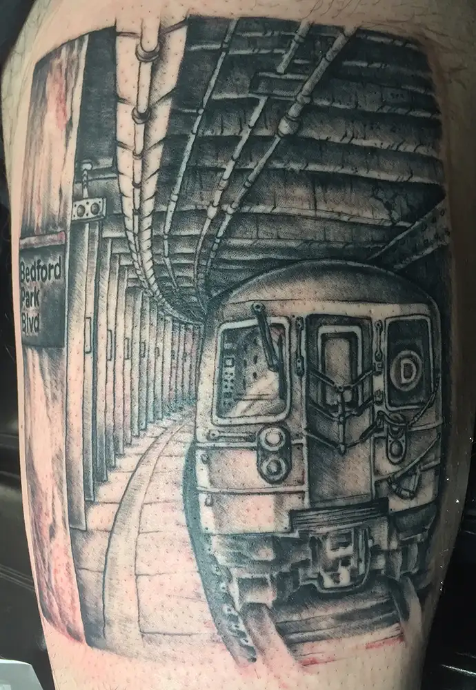bronx new york D train thigh tattoo